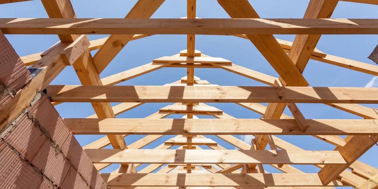 Roof trusses against blue sky