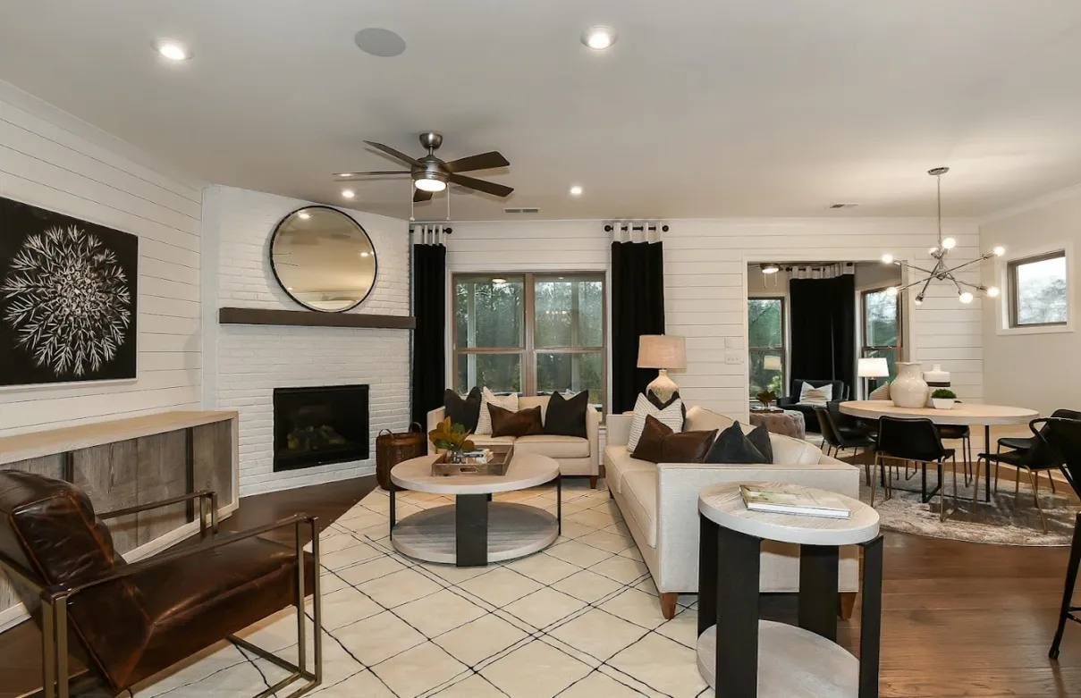Living room with shiplap fireplace wall